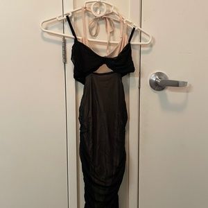 Ruched black and nude dress.